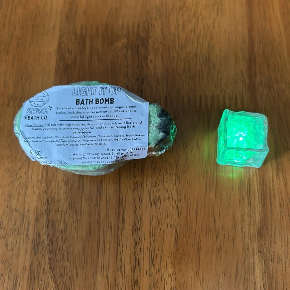 Bath bomb. Christmas bulb design with Christmas cookie smell. Lights up